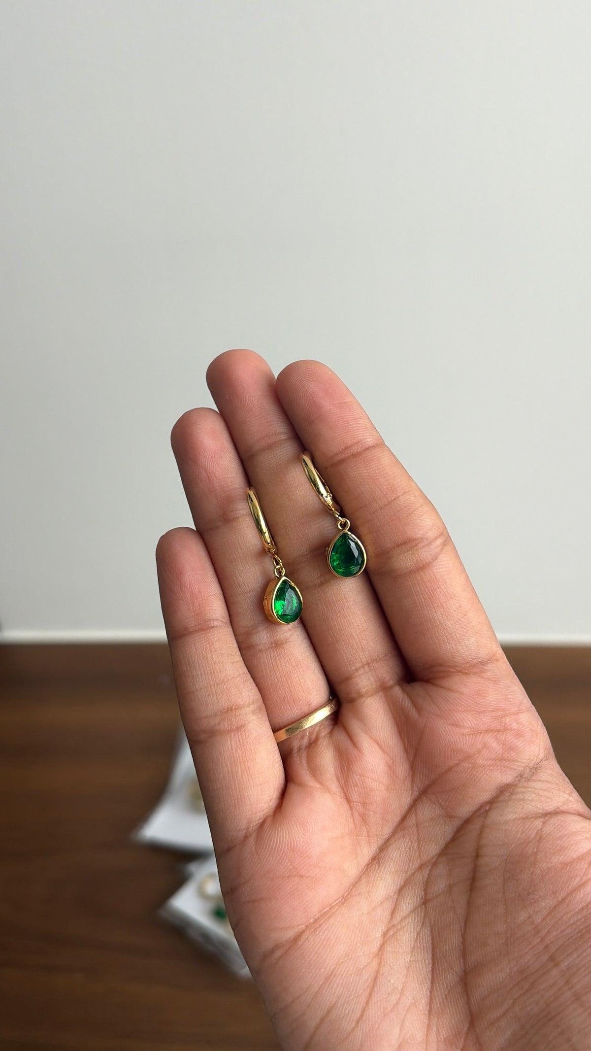 Emerald drop huggies