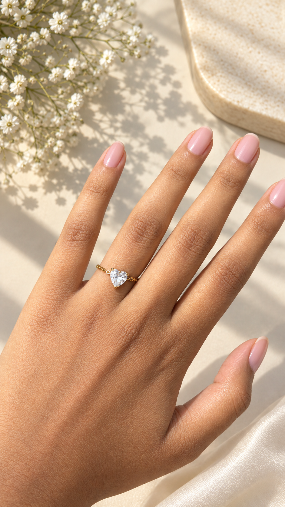 Adjustable heart ring