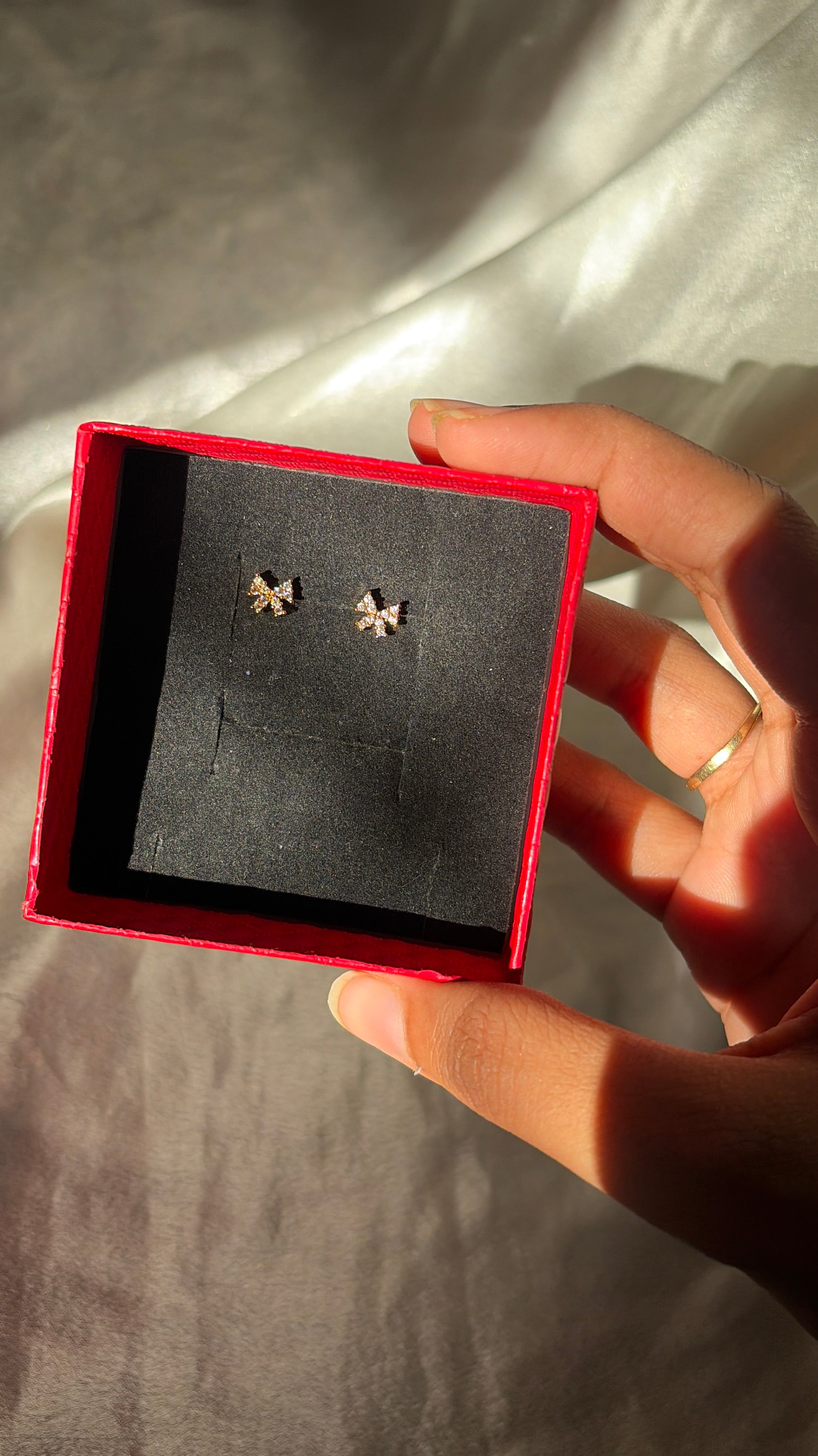 Bow piercing earring
